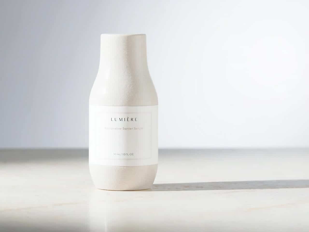 Luma Ray 3.2 AI video example: Animate the skincare bottle still with a gentle clockwise camera drift, preserve bottle shape and label or...
